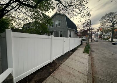 Vinyl fence by Fence Imperial, showcasing a sleek and modern design with low-maintenance features for a contemporary look.