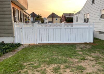 Vinyl fence by Fence Imperial, showcasing a sleek and modern design with low-maintenance features for a contemporary look.