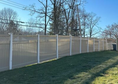 Vinyl fence by Fence Imperial, showcasing a sleek and modern design with low-maintenance features for a contemporary look.