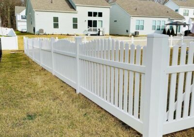 Vinyl fence by Fence Imperial, showcasing a sleek and modern design with low-maintenance features for a contemporary look.