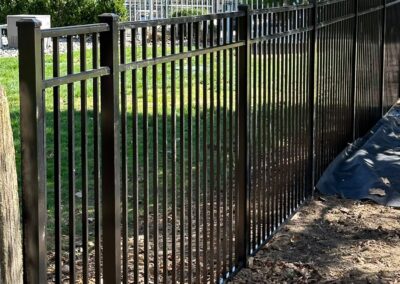 Aluminum fence by Fence Imperial, featuring a sleek and modern design with durable construction for enhanced security and style.