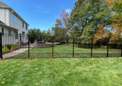 Aluminum fence by Fence Imperial, featuring a sleek and modern design with durable construction for enhanced security and style.